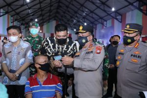 Vaksinasi Massal 1.000 Orang, Ini Pesan Kapoldasu : Masyarakat Kota Medan yang Sudah Vaksin Tetap Patuhi prokes